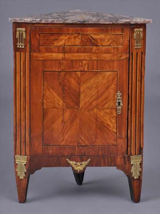 Appraisal: LOUIS XVI GILT-METAL MOUNTED TULIPWOOD AND MARQUETRY ENCOIGNURE The later