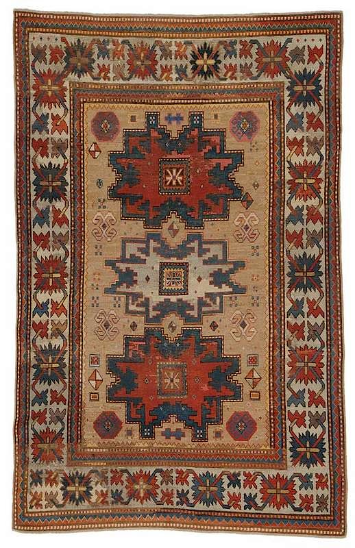 Appraisal: Caucasian Rug early th century three medallions on camel field