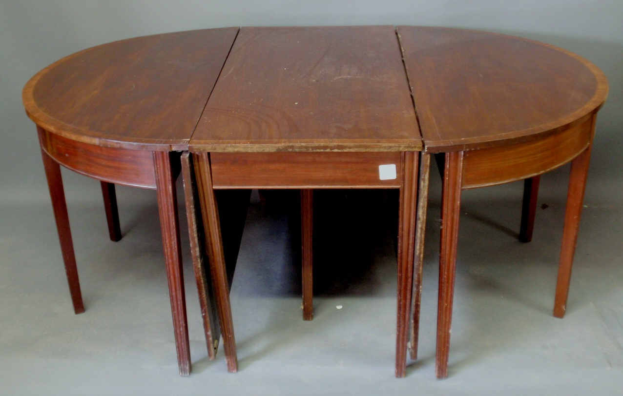 Appraisal: Chippendale mahogany banquet table three-part with cross-banded top and molded