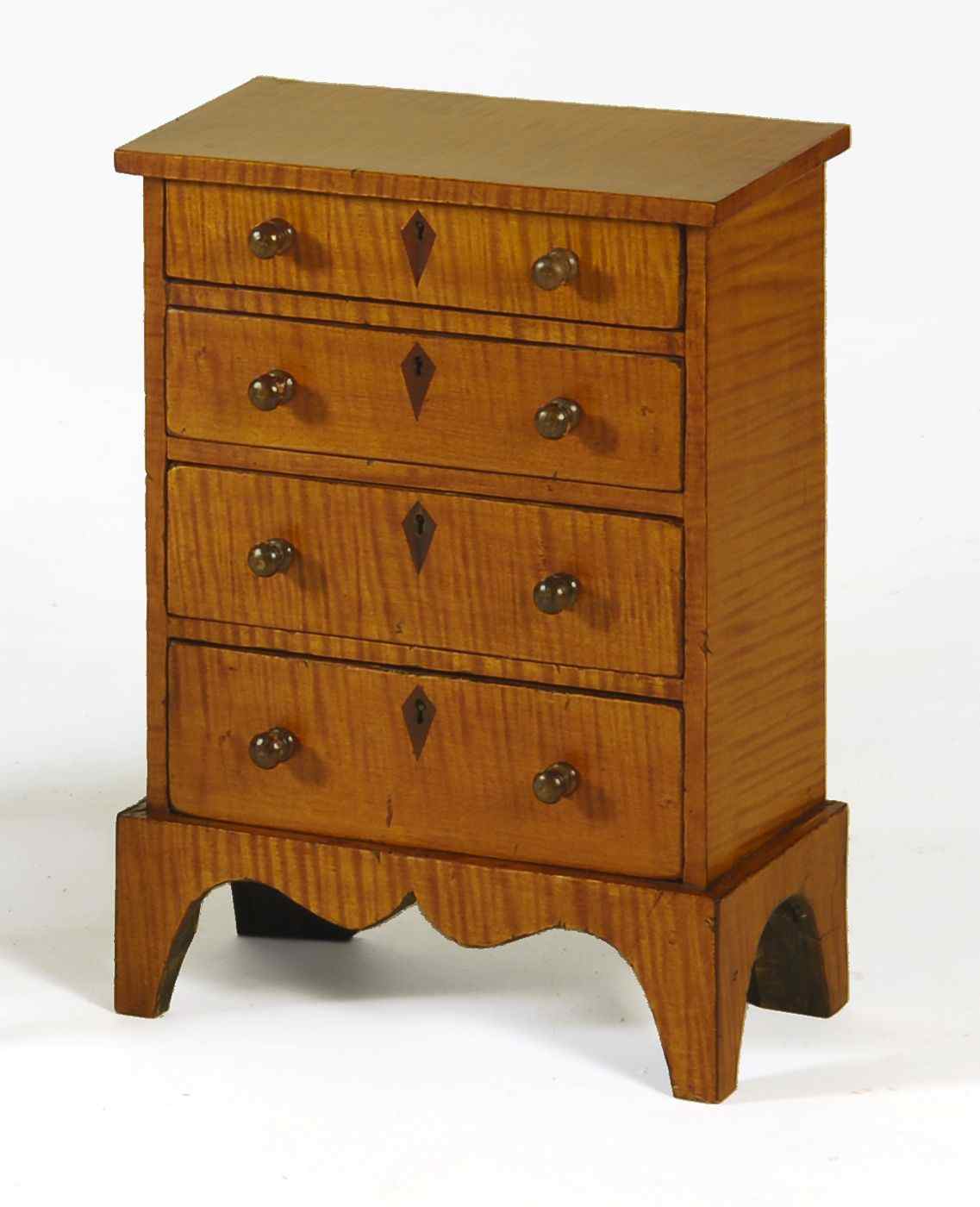 Appraisal: MINIATURE ANTIQUE AMERICAN FEDERAL FOUR-DRAWER CHESTLate th Early th CenturyIn