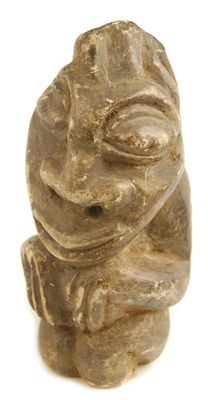 Appraisal: A carved stone Nomali fetish figure in cm h