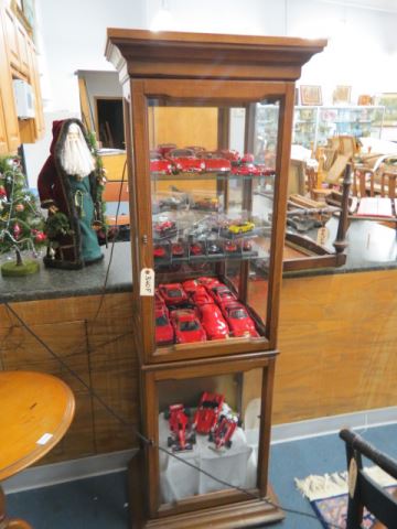 Appraisal: Display Cabinet pecan finish mirrored back glass shelves lights