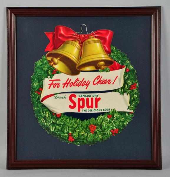 Appraisal: Cardboard Spur Cola Christmas Wreath Cutout Circa Nicely framed under