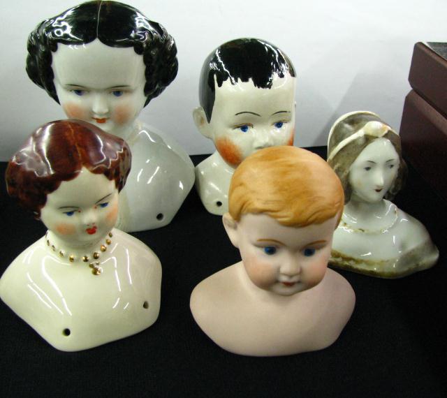 Appraisal: Group of Five Antique China Doll heads ranging from ''