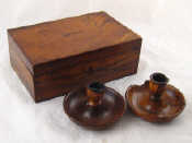 Appraisal: Judaica A pair of cedarwood travelling demountable bun candlesticks some