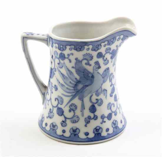 Appraisal: A Chinese Porcelain Creamer having blue on white bird and