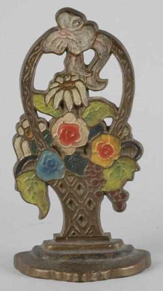 Appraisal: Cast Iron Deco Flower Doorstop Description Marked LACS - Condition