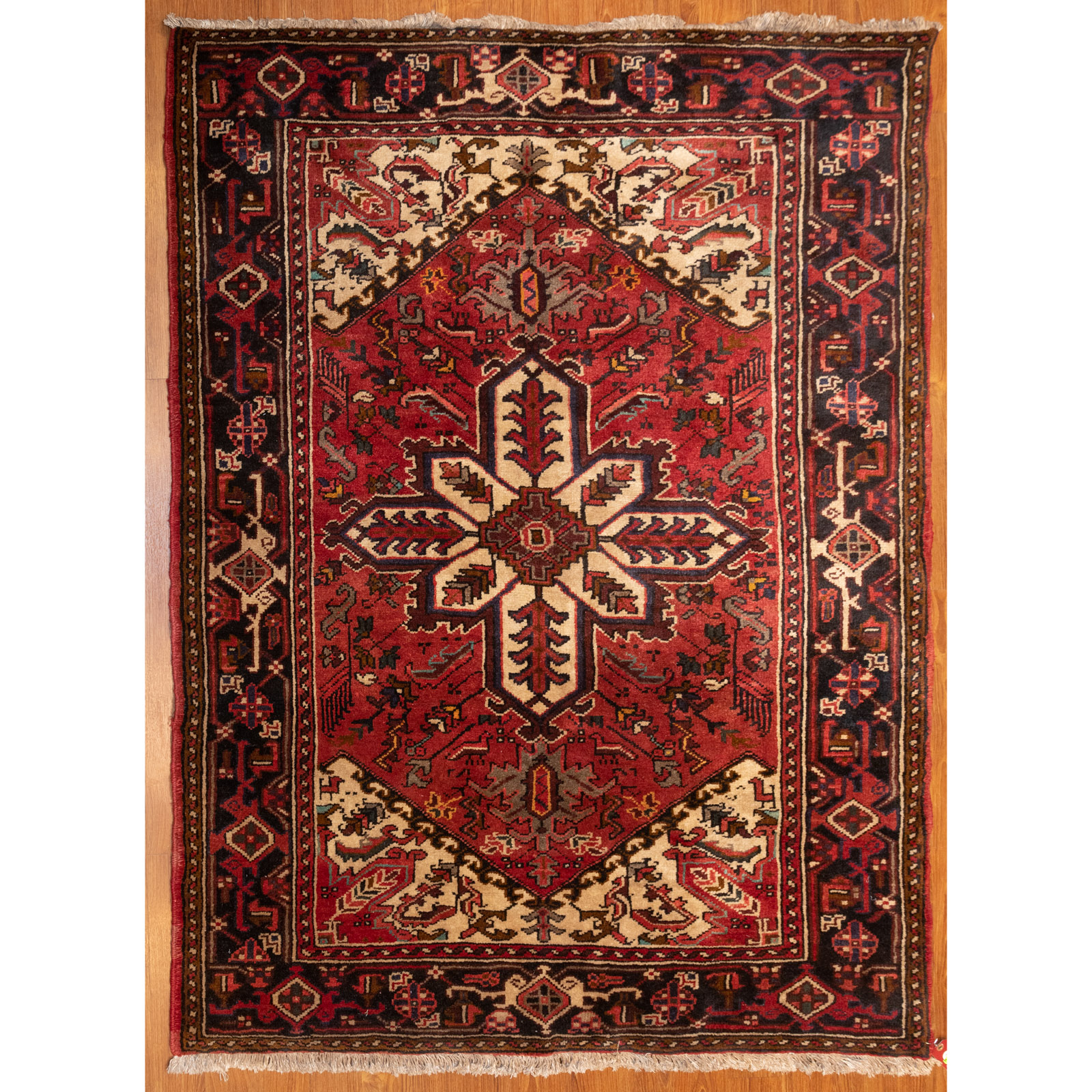 Appraisal: HERIZ RUG PERSIA X Fourth quarter- th century hand-knotted wool