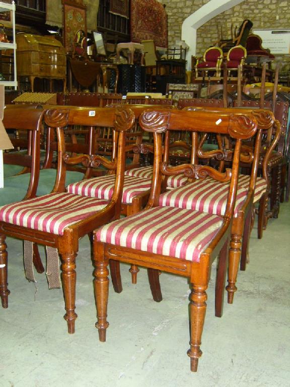 Appraisal: A set of four Victorian mahogany spade back dining chairs