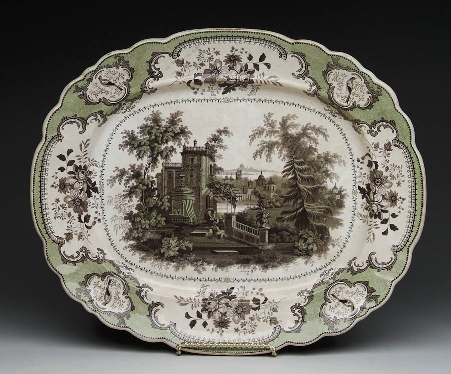 Appraisal: UNUSUAL GREEN AND BROWN TRANSFER STAFFORDSHIRE PLATTER The central scene