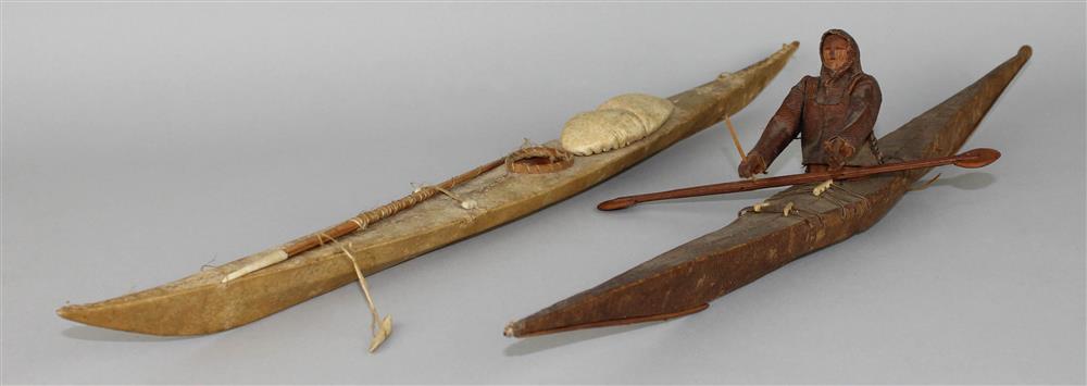 Appraisal: TWO INUIT HIDE AND WOOD KAYAK MODELS each single cockpit