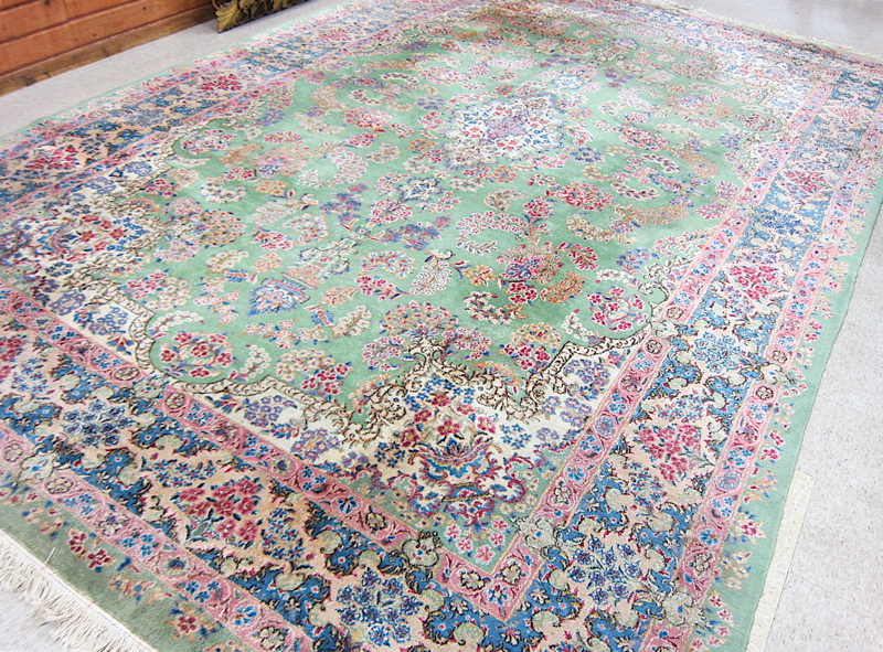 Appraisal: SEMI-ANTIQUE PERSIAN KERMAN CARPET hand knotted in a central floral