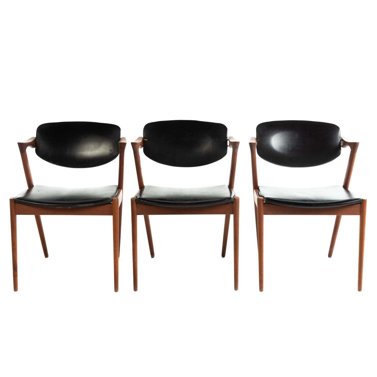 Appraisal: THREE DANISH MODERN TEAK CHAIRS Mid- th century teak wood