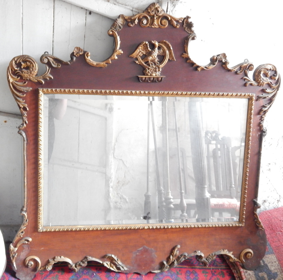 Appraisal: An thC parcel gilt mahogany wall mirror of rococo scrolling