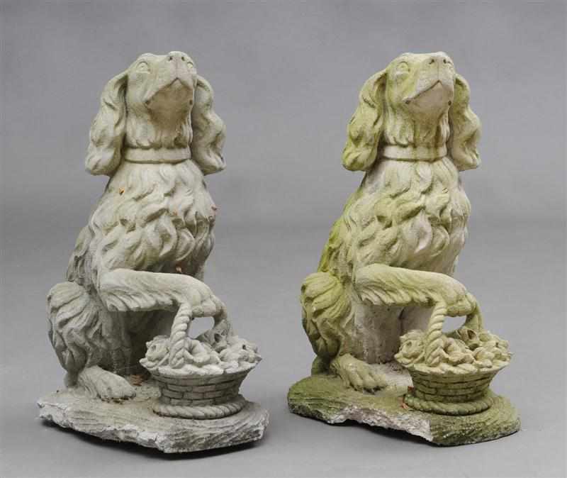 Appraisal: PAIR OF CAST STONE GARDEN FIGURES OF SEATED SPANIELS Each