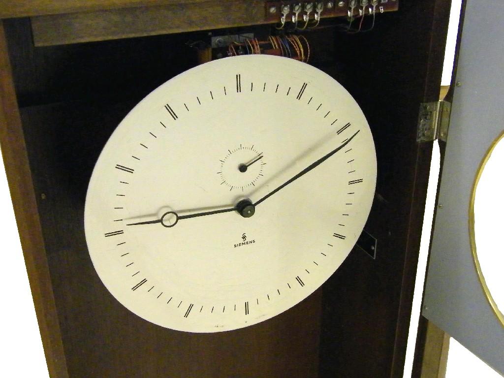 Appraisal: Oak two train wall clock American ogee two train wall