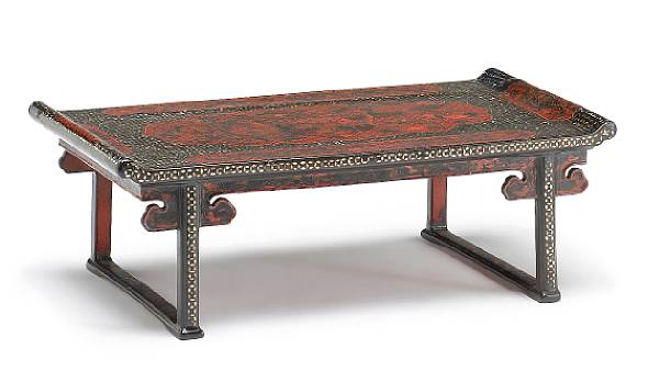 Appraisal: A polychrome lacquered wood kang table with mother-of-pearl and incised