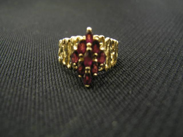 Appraisal: Garnet Ring marquis shaped gems in k yellow gold