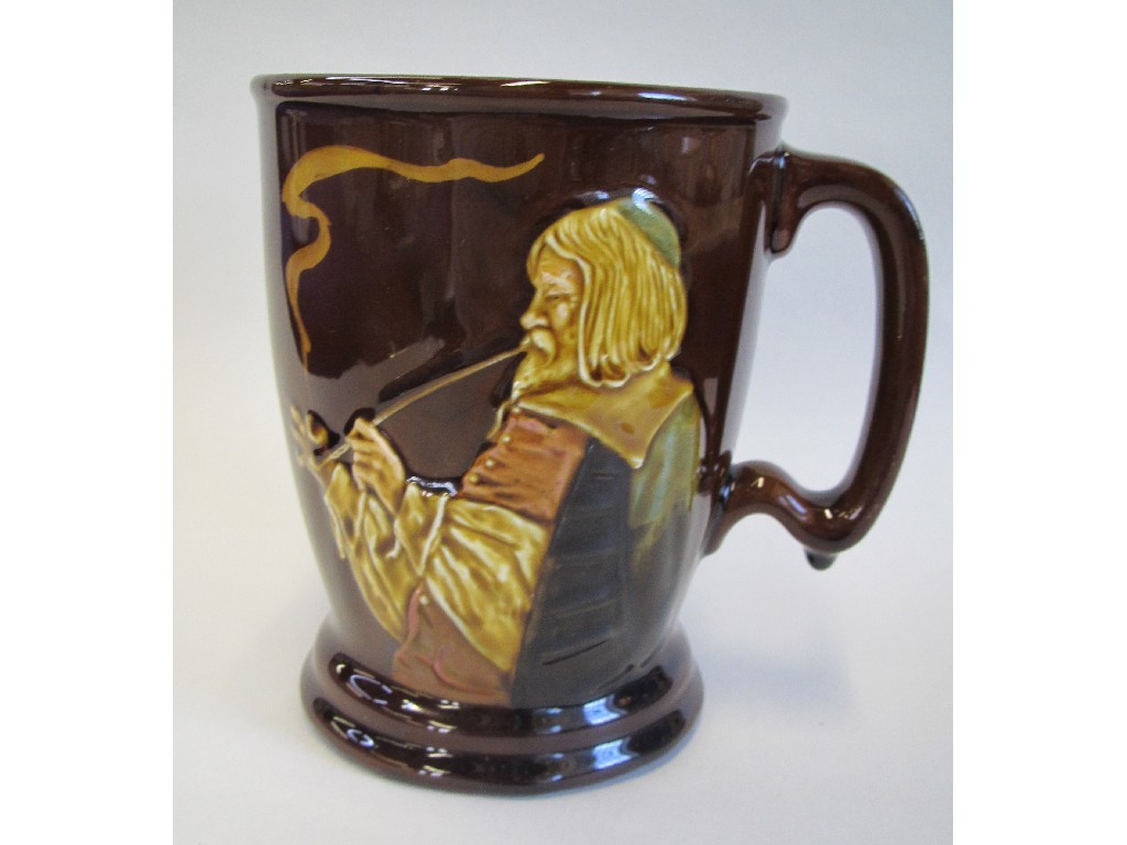 Appraisal: Royal Doulton Kingsware mug decorated in relief with a man