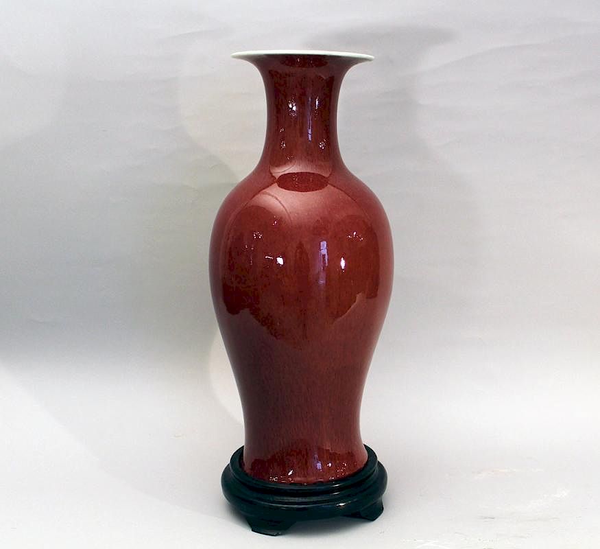 Appraisal: Chinese oxblood vase Chinese oxblood vase in elegan baluster shape