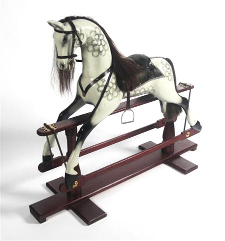 Appraisal: A late th century grey painted rocking horse with brown