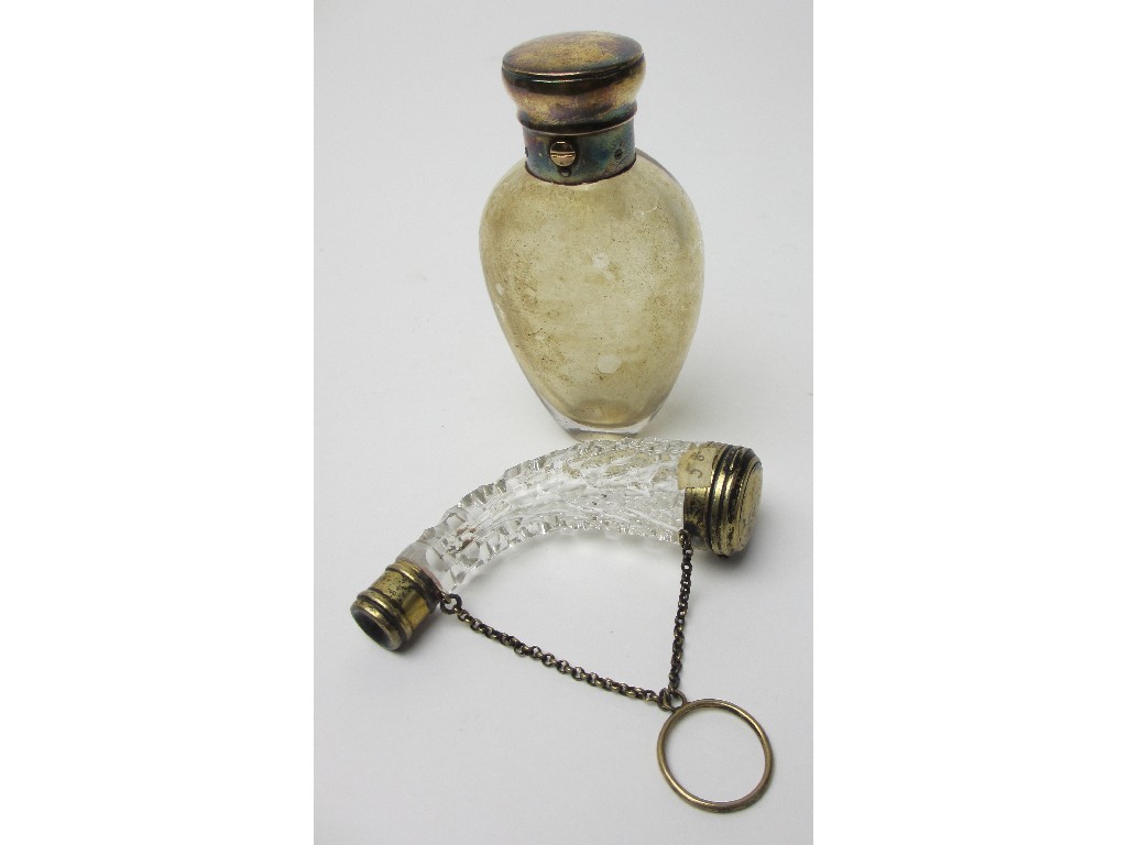 Appraisal: A rock crystal and gilt metal mounted trumpet shaped scent