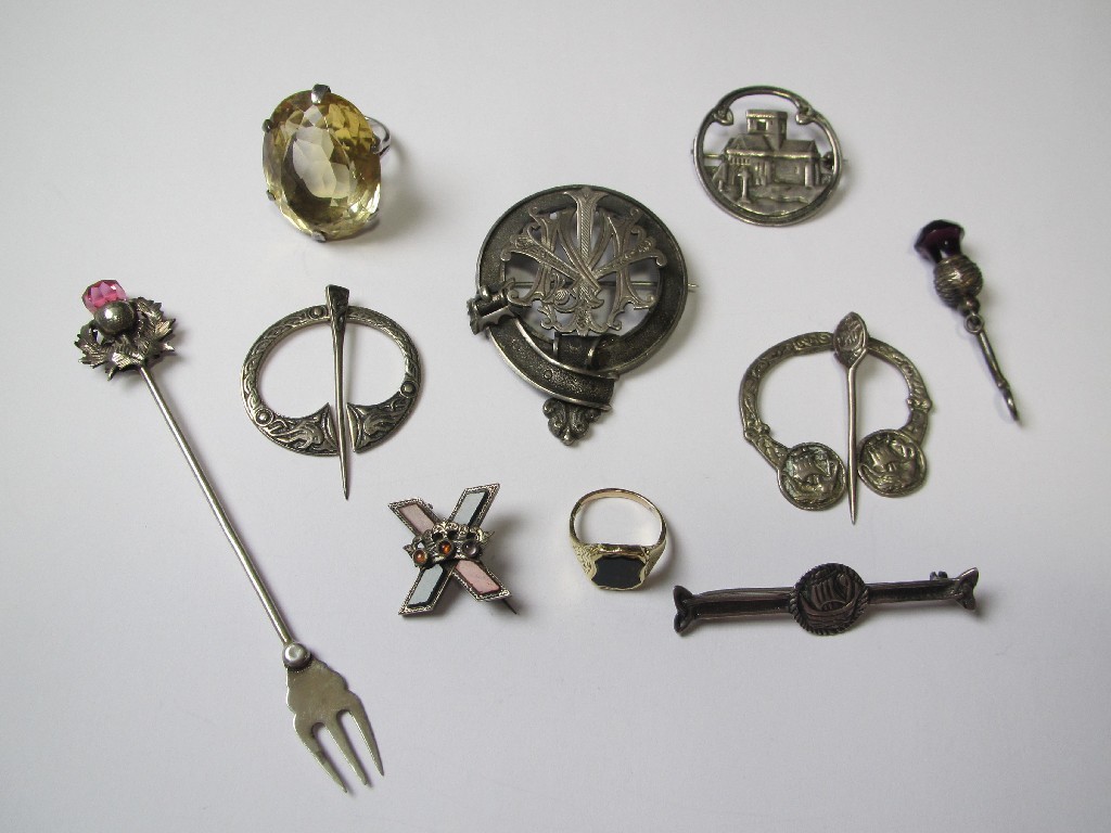 Appraisal: A lot of Scottish silver brooches a yellow metal ring