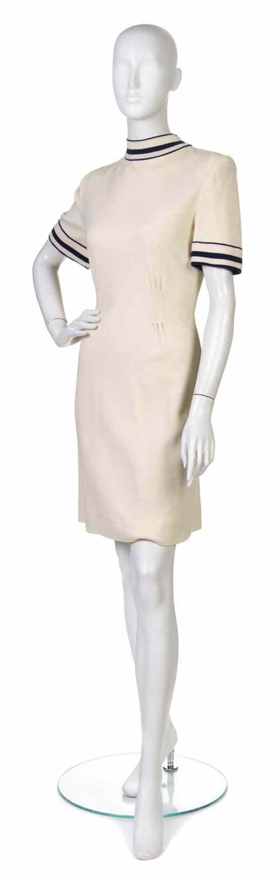 Appraisal: A Pauline Trigere Cream Wool Dress navy stripe trim Labeled