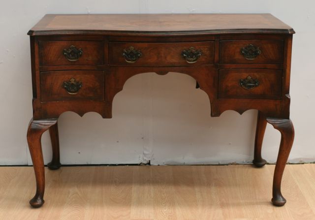 Appraisal: A George II style walnut lowboy cm wide cm deep