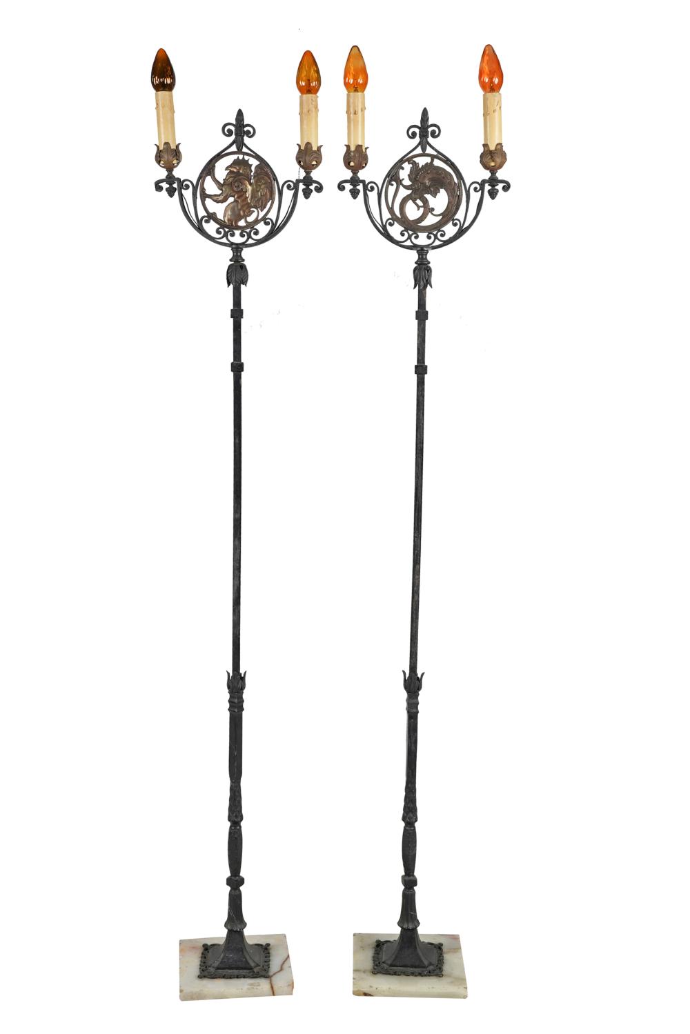 Appraisal: PAIR OF WROUGHT IRON PATINATED METAL TORCHIERESeach on an onyx