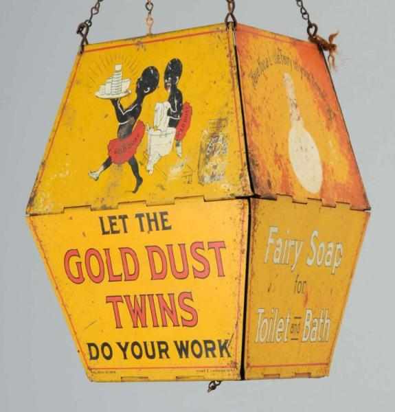 Appraisal: Tin Gold Dust Twins String Holder Description Rare Condition Good