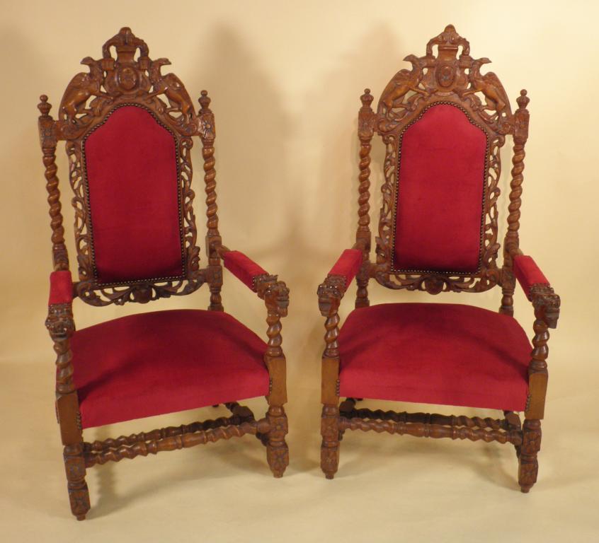 Appraisal: A pair of continental carved beech open armchairs each with