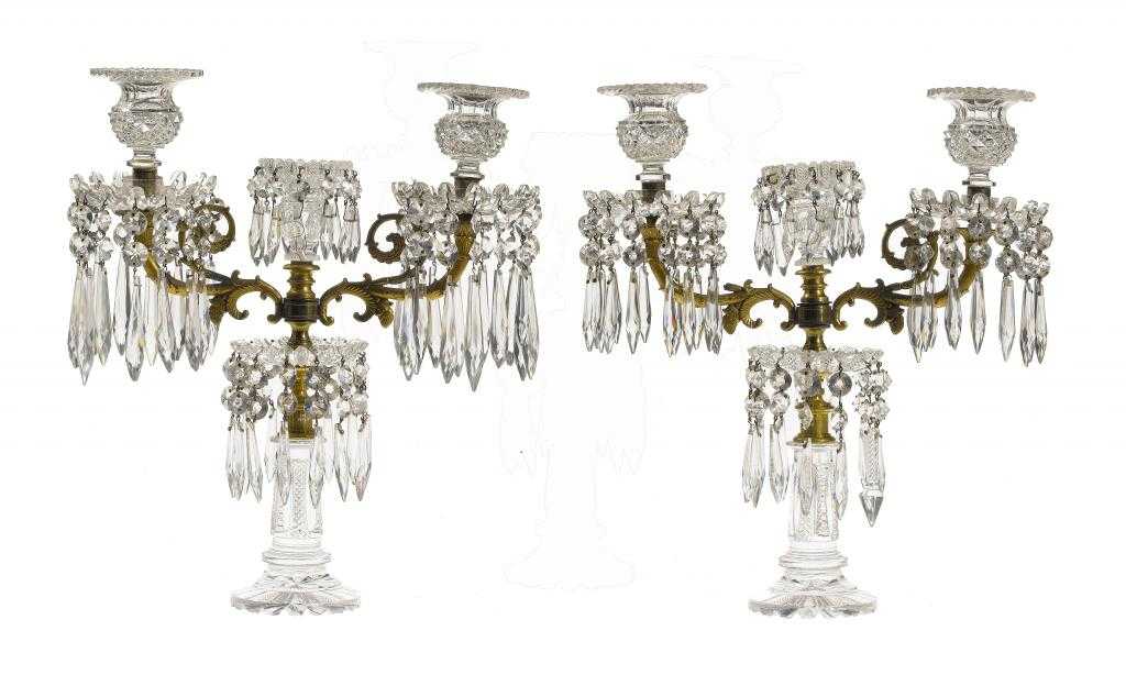 Appraisal: A PAIR OF ENGLISH CUT GLASS AND GILT BRASS CANDELABRA