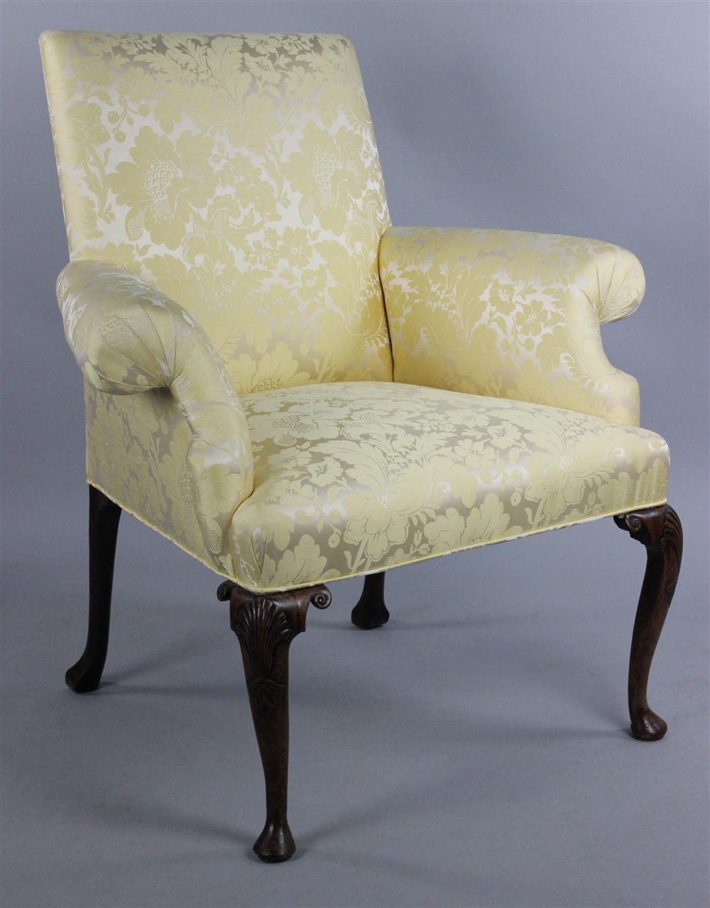 Appraisal: QUEEN ANNE GEORGE I TRANSITIONAL CARVED AND UPHOLSTERED LIBRARY CHAIR