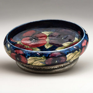 Appraisal: Moorcroft English th Century Pansy Bowl glazed earthenware with pewter