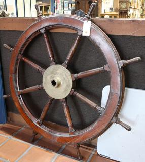 Appraisal: Large quartersawn oak ship's wheel having eight turned spokes continuing