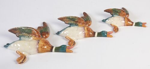 Appraisal: A graduated set of three Beswick flying ducks printed marks