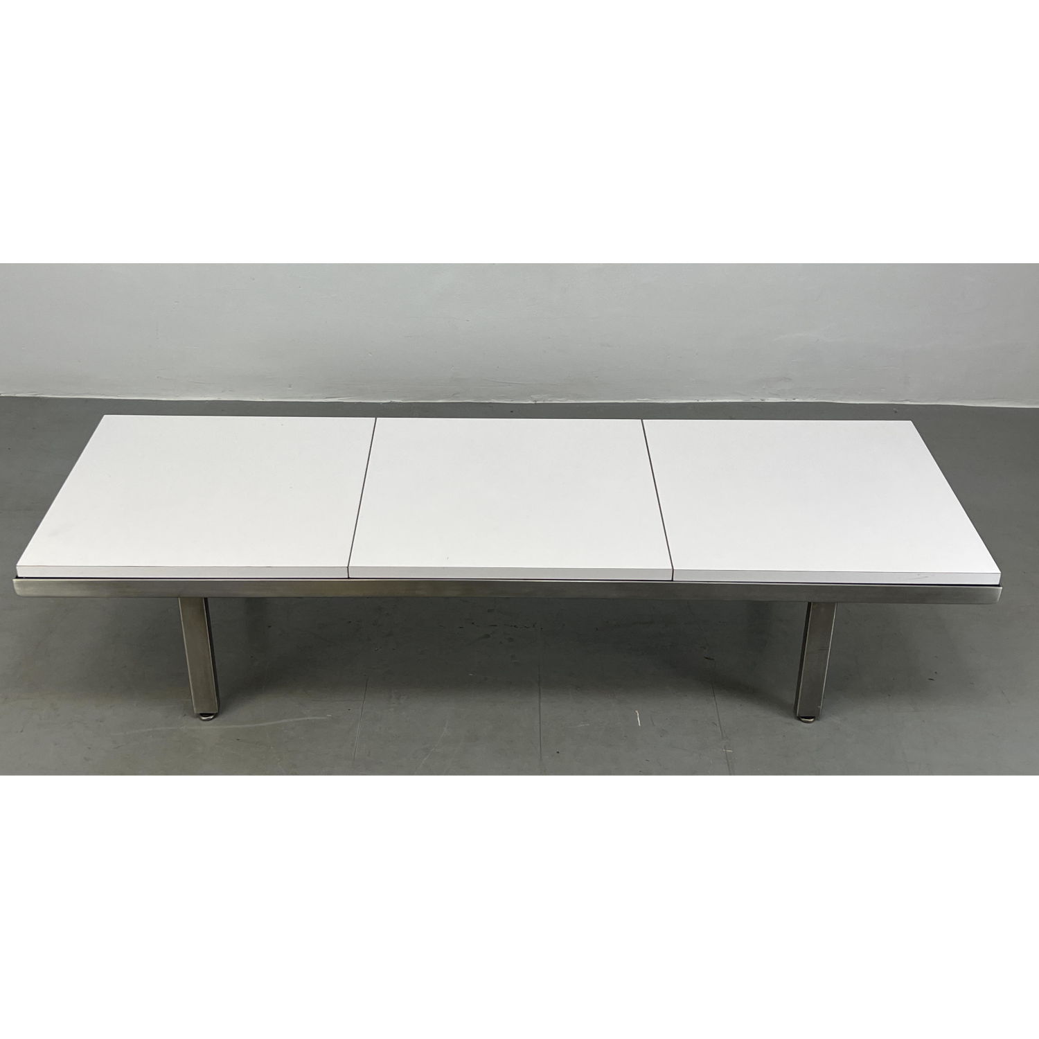 Appraisal: Herman Miller white laminate and brushed steel bench coffee table