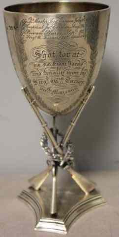 Appraisal: STERLING English Trophy Cup With Rifles Support Engraved ''Challenge cup