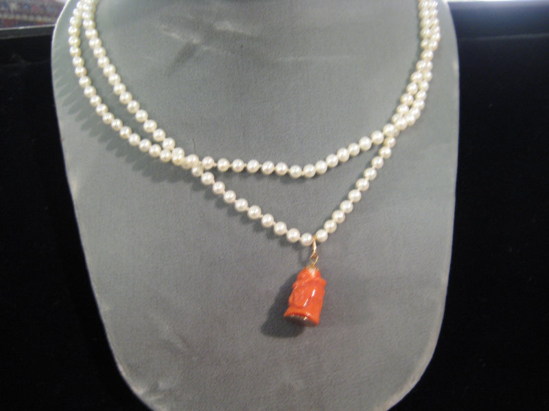 Appraisal: PEARL NECKLACE Cultured pearl necklace with mm pearls and coral