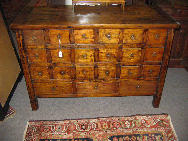 Appraisal: ASIAN APOTHECARY CHEST OF DRAWERS Rectangular top over the assortment