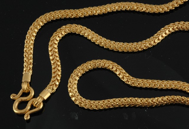 Appraisal: A GOLD CHAIN The ct gold fancy fox tail link