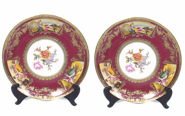 Appraisal: A set of twelve paint decorated porcelain plates diameter in