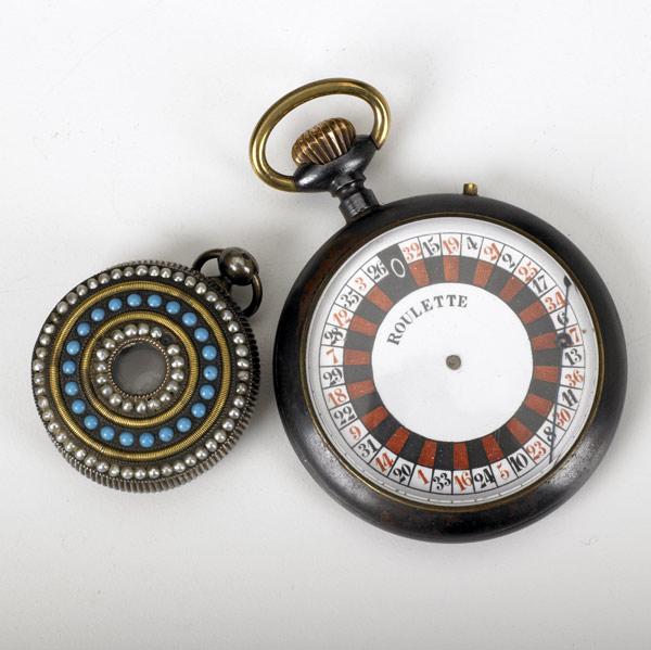 Appraisal: ROULETTE WHEEL STOPWATCH Together with a telescoping pendant with seed