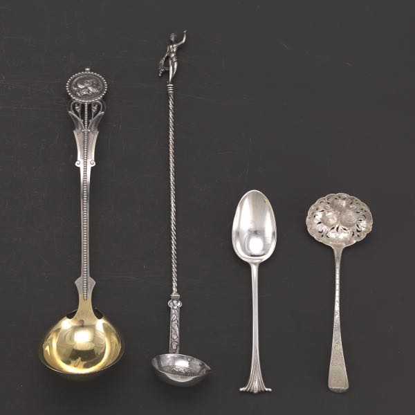 Appraisal: A GROUP OF STERLING SILVER LADLES AND SPOONS to -