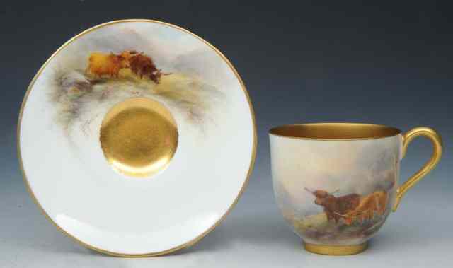 Appraisal: A ROYAL WORCESTER PORCELAIN SMALL CUP and saucer painted with