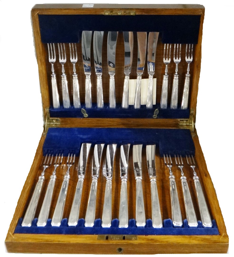 Appraisal: Twelve pairs of silver handled dessert knives and forks with