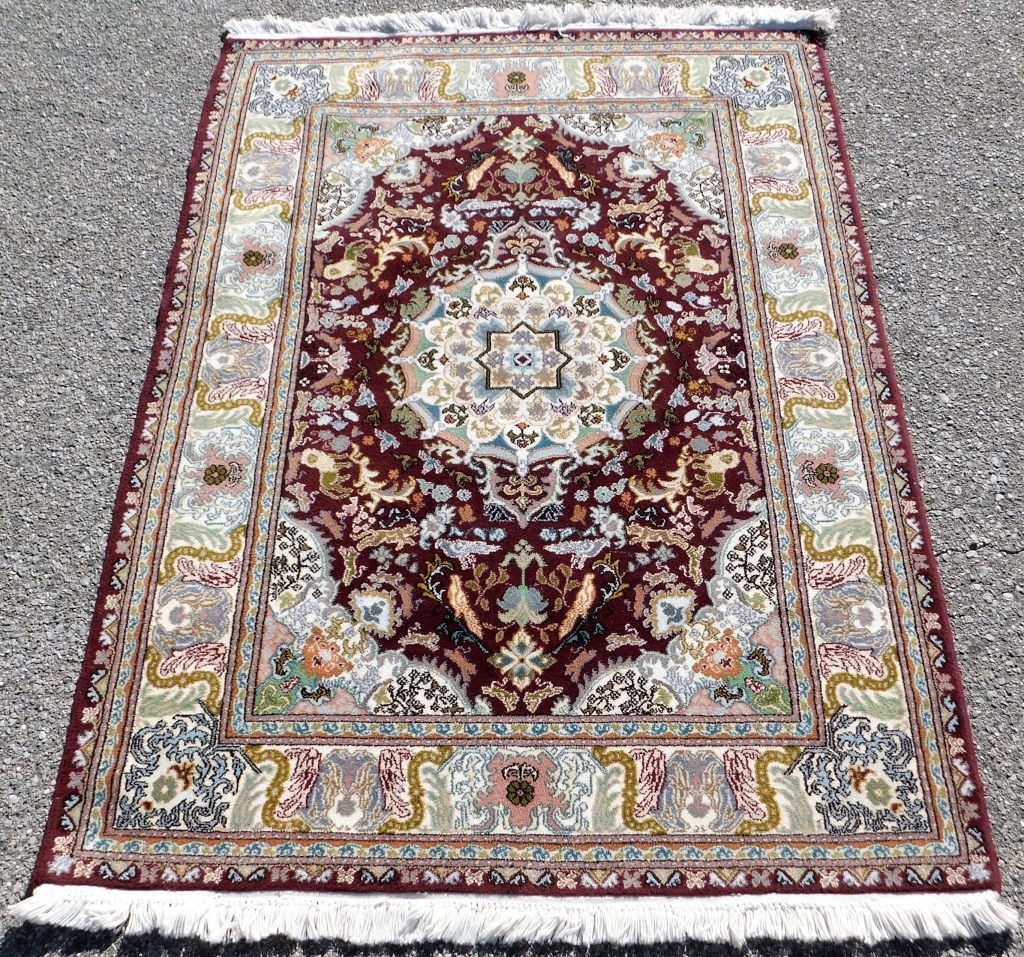 Appraisal: MOROCCAN BOTANICAL RUG Morocco th CenturyBlue green orange black and