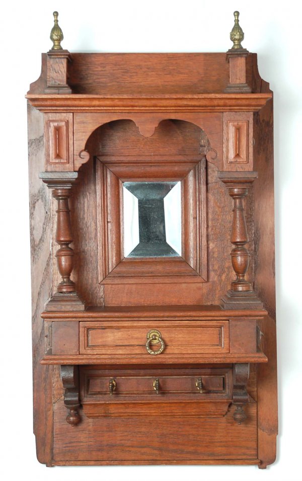 Appraisal: Key cabinet with mirror Beveled glass mirror with turned columns