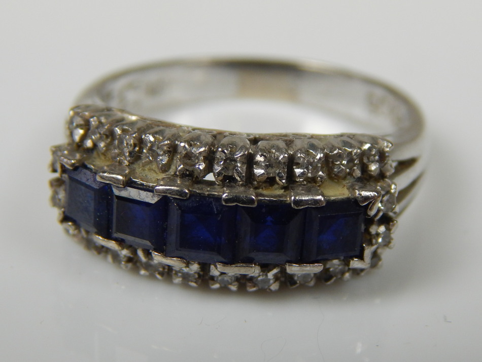 Appraisal: A sapphire and diamond dress ring with five square cut